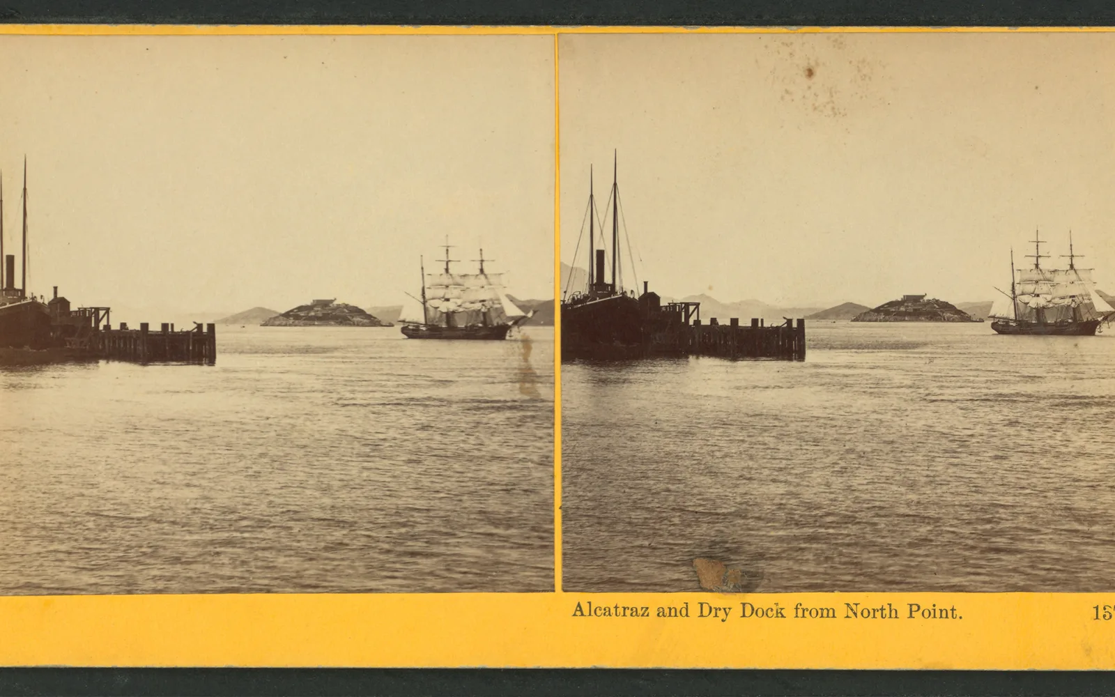 Vintage stereoscopic view of Alcatraz and Dry Dock from North Point on San Francisco Bay